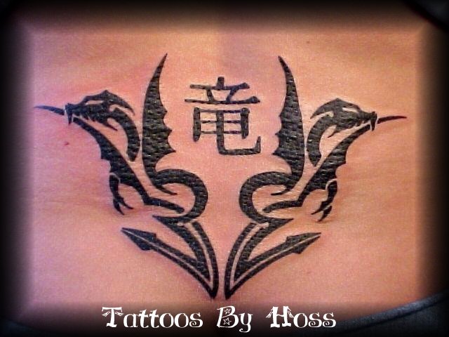 Tatuaże wzory - tribal twin dragon tattoo.jpg